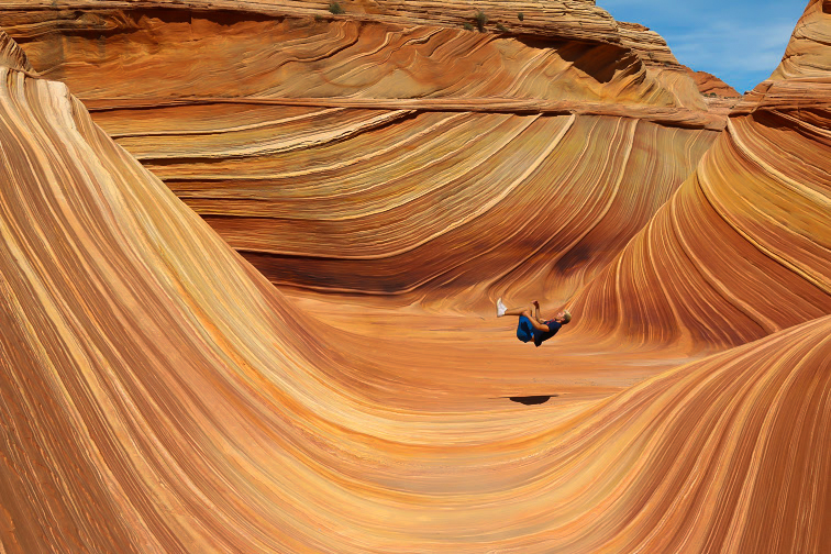 The Impulsive Traveler creator doing a backflip inside of the wave in Utah, USA. 